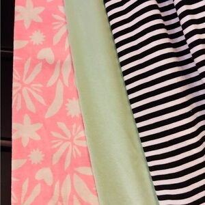Pink Floral and Black Striped Fabrics